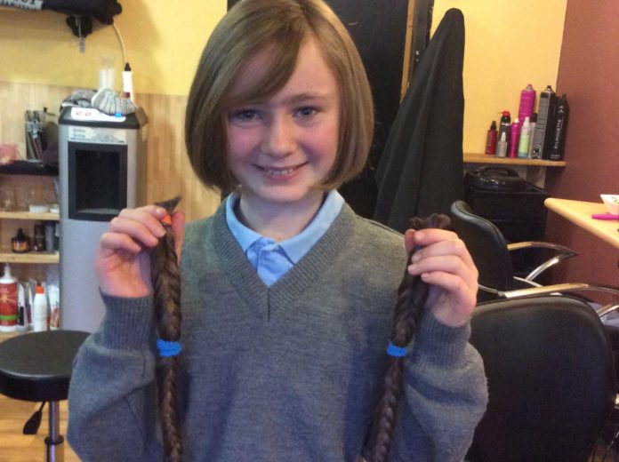 Ava with her lovely plaits following 'the cut'.