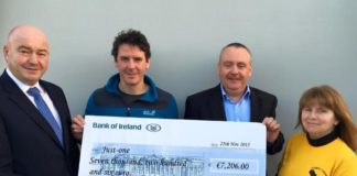 Thomas hands over cheque after high-altitude marathon