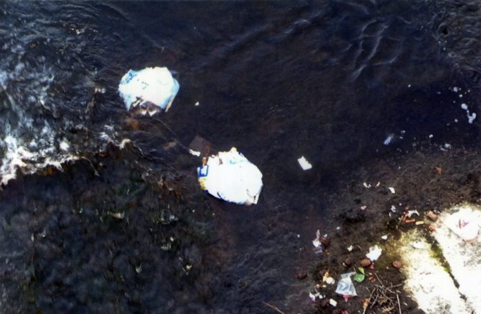 The two bags of refuse dumped in the river at Ballyhooly bridge.