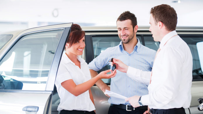 Couple Buying A New Car