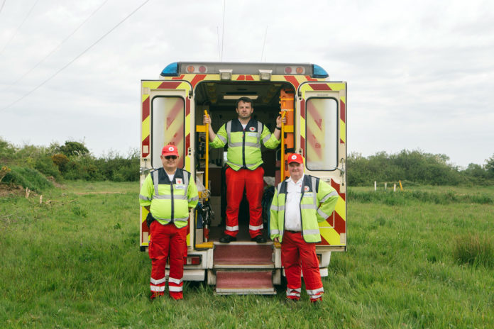 IRC Volunteers with ambulance