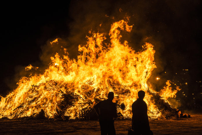 Bonfire on a beach at night, Costa Brava, Spain