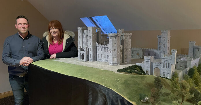 Darren Darcy with Bláthnaid ní Chofaigh and his model of Mitchelstown Castle.