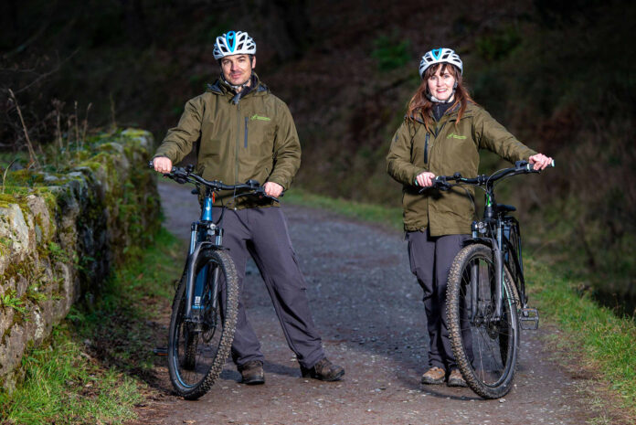 Fisheries officers with ebikes on their rounds.