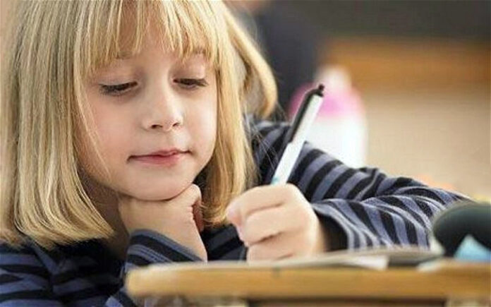 Girl Writing Letter Web Stock@30-04-2020-17:00:29.jpg