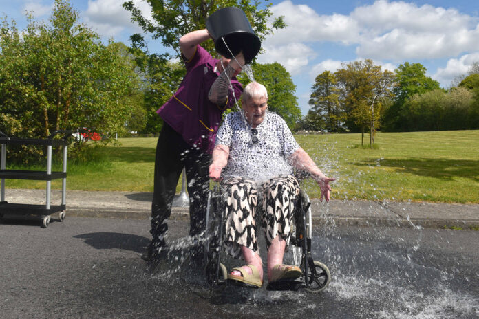 Darragh O’Connell doing the 'honours' for Gloria. (Pic: Katie Glavin)